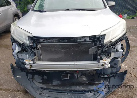 2015 Honda Cr-V Lx z USA, uszkodzony, nr VIN 5J6RM4H35FL058088